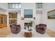 Living room boasting a wine cellar, fireplace and soaring ceilings at 1211 Oakdale Ne Rd, Atlanta, GA 30307