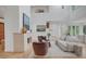 Bright living room with high ceilings, a fireplace, and ample natural light at 1211 Oakdale Ne Rd, Atlanta, GA 30307