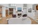 Cozy living room with a fireplace, wine storage, and hardwood floors at 1211 Oakdale Ne Rd, Atlanta, GA 30307