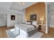 Bright main bedroom with hardwood floors, tray ceiling and an ensuite bathroom at 1211 Oakdale Ne Rd, Atlanta, GA 30307
