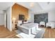 Luxurious main bedroom with a statement wood wall and elegant decor at 1211 Oakdale Ne Rd, Atlanta, GA 30307