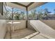 Relaxing shaded patio with trees, table and chairs at 1211 Oakdale Ne Rd, Atlanta, GA 30307