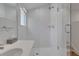 Clean bathroom shower stall with glass doors, modern fixtures, and bright lighting at 1211 Oakdale Ne Rd, Atlanta, GA 30307