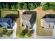 Aerial view of the property showcasing the house, driveway, and backyard at 1250 Edgebrook Ln, Snellville, GA 30078