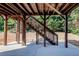 Outdoor patio with wooden stairs leading to the backyard, perfect for enjoying outdoor space at 1250 Edgebrook Ln, Snellville, GA 30078
