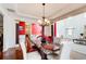 Elegant dining room showcasing marble table, decorative lighting, and seamless access to living area at 1250 Edgebrook Ln, Snellville, GA 30078
