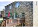 Brick home featuring an elevated wooden deck at 1250 Edgebrook Ln, Snellville, GA 30078