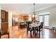 Eat-in kitchen with island seating, hardwood floors and stainless steel appliances at 1250 Edgebrook Ln, Snellville, GA 30078