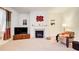 Cozy living room showcases a fireplace at 1250 Edgebrook Ln, Snellville, GA 30078
