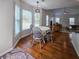 Bright eat-in dining area overlooking the living room with hardwood floors and lots of natural light at 2004 Westover Nw Ln, Kennesaw, GA 30152