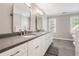 A beautifully appointed bathroom with double sinks and a stylish vanity at 2849 Livsey Woods Dr, Tucker, GA 30084
