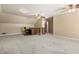 Spacious bonus room features neutral carpet, ceiling fans, and a nook with built-in desk at 2849 Livsey Woods Dr, Tucker, GA 30084