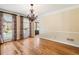 Open-concept dining room features hardwood floors and ample natural light at 2849 Livsey Woods Dr, Tucker, GA 30084