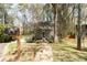 Home with a mailbox, set in a neighborhood with mature trees and landscaping, offering a serene setting at 1468 Cheyenne Ct, Stone Mountain, GA 30087