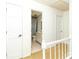Bright hallway leading to a bathroom at 1468 Cheyenne Ct, Stone Mountain, GA 30087