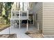 Backyard patio with stairs to a deck, perfect for outdoor relaxation and entertaining at 1468 Cheyenne Ct, Stone Mountain, GA 30087
