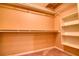 Walk-in closet with built-in shelves and rods for organized storage at 1510 Wood Thrush Way, Marietta, GA 30062