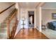 Inviting foyer with hardwood floors and a staircase, offering a glimpse into the home's interior layout and design at 1510 Wood Thrush Way, Marietta, GA 30062