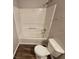 Cozy bathroom featuring a shower and tub combo and modern commode at 3763 Waldrop Hills Dr, Decatur, GA 30034