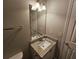 Bathroom featuring granite countertop vanity, modern lighting, and a mirror at 3763 Waldrop Hills Dr, Decatur, GA 30034