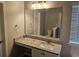 Bathroom showcasing granite countertop vanity with a large mirror at 3763 Waldrop Hills Dr, Decatur, GA 30034