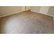 Large bedroom showcasing neutral walls, carpet, and ample closet space at 3763 Waldrop Hills Dr, Decatur, GA 30034