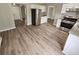 Well-lit kitchen boasts stainless steel appliances, granite countertops, and modern flooring at 3763 Waldrop Hills Dr, Decatur, GA 30034