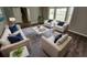 Tastefully decorated living room with new wood flooring, modern furniture, and lots of natural light at 3763 Waldrop Hills Dr, Decatur, GA 30034