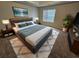 Staged bedroom with plush rug, stylish furniture, and modern decor at 3763 Waldrop Hills Dr, Decatur, GA 30034
