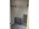 Walk-in closet with wire shelving, shoe rack, and full length mirror at 6311 Olmadison Pl, Atlanta, GA 30349