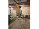 Spacious garage with high ceilings and ample storage space at 6311 Olmadison Pl, Atlanta, GA 30349