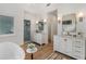 Bathroom boasts dual vanities, a glass shower, and a modern soaking tub at 1503 Emory Ne Rd, Atlanta, GA 30306