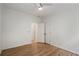 Bedroom with hardwood floors, a ceiling fan, and multiple closets for ample storage space at 1503 Emory Ne Rd, Atlanta, GA 30306