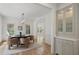Bright dining room featuring modern lighting, neutral colors, and a built-in cabinet at 1503 Emory Ne Rd, Atlanta, GA 30306