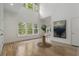 Bright foyer with hardwood floors, soaring ceilings, and natural light from large windows at 1503 Emory Ne Rd, Atlanta, GA 30306
