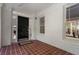 Inviting front porch featuring brick flooring and an exterior view at 1503 Emory Ne Rd, Atlanta, GA 30306