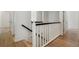 Hallway with hardwood floors, white wainscoting, and access to multiple rooms at 1503 Emory Ne Rd, Atlanta, GA 30306