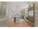 Open concept kitchen with stainless steel appliances and light colored cabinets at 1503 Emory Ne Rd, Atlanta, GA 30306