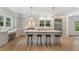Open kitchen with a large island, breakfast bar, and stainless steel appliances at 1503 Emory Ne Rd, Atlanta, GA 30306