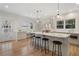 Kitchen with a large island, seating, stainless steel appliances, and natural lighting at 1503 Emory Ne Rd, Atlanta, GA 30306
