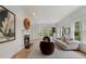 Elegant living room featuring a fireplace, plush seating, and ample natural light at 1503 Emory Ne Rd, Atlanta, GA 30306