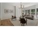 Bright living room featuring hardwood floors, modern furnishings, and large windows for natural light at 1503 Emory Ne Rd, Atlanta, GA 30306