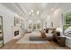Spacious main bedroom with fireplace, tray ceiling, and sitting area overlooking the yard at 1503 Emory Ne Rd, Atlanta, GA 30306