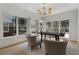 Bright home office with large windows, built-in shelving, and modern furnishings at 1503 Emory Ne Rd, Atlanta, GA 30306