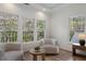 Cozy sitting area with large windows offers great natural light and beautiful views at 1503 Emory Ne Rd, Atlanta, GA 30306