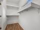 Walk-in closet with shelving, rod, and window provides ample storage space at 1503 Emory Ne Rd, Atlanta, GA 30306
