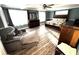 Spacious main bedroom offers ample natural light, wood-look floors, and decorative furnishings at 1718 Pucketts Sw Dr, Lilburn, GA 30047