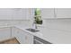 Contemporary kitchen featuring white cabinets, stainless steel appliances, quartz counters, and subway tile backsplash at 3406 Randell Brown Avenue Unit 3, Atlanta, GA 30354