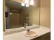 Bathroom with a large mirror, single sink vanity, and a shower/tub combo at 6113 Princeton Ave, Morrow, GA 30260
