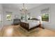 Bedroom boasts a neutral color palette, with abundant natural light, hardwood floors and designer furnishings at 1311 Berwick Ne Ave, Atlanta, GA 30306